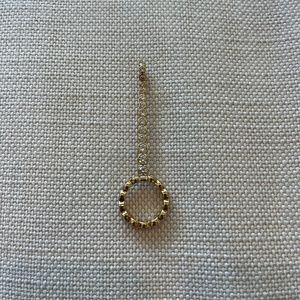 Gold plated with clear stones cigarette holder/joint holder ring.